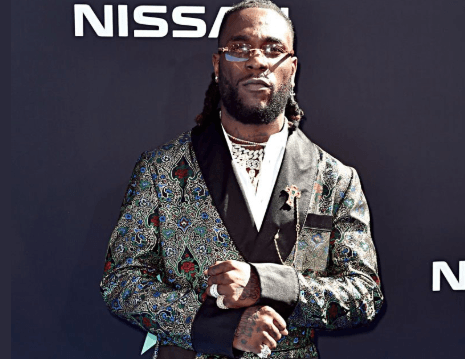 #BETAwards: Burnaboy’s Mum Accepts His BET Award On His Behalf