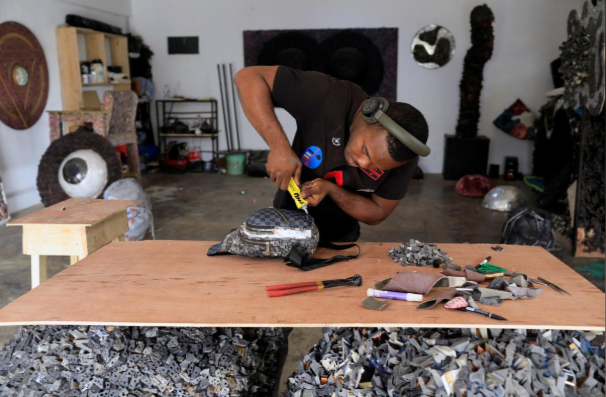 How Artist Adeyemi Emmanuel Is turning Rubber Waste Into Fashion