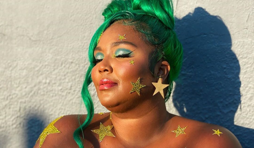 Lizzo Dazzles in Starry Half-Naked Photos
