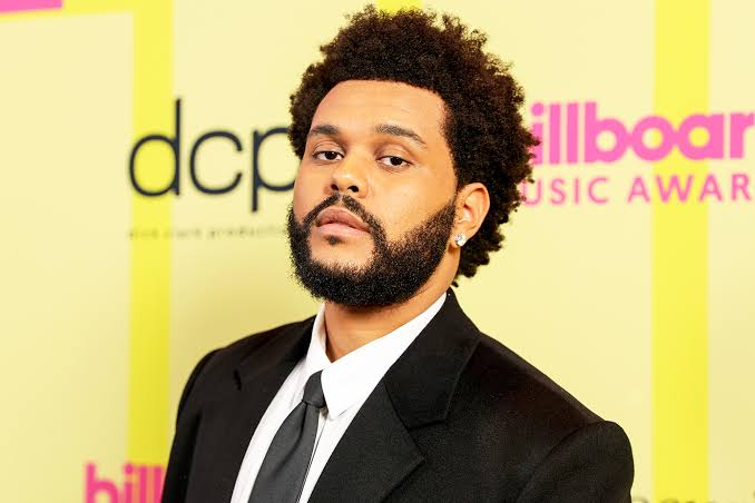 The Weeknd Shares Kiss with Simi Khadra During His 32nd Birthday Celebration