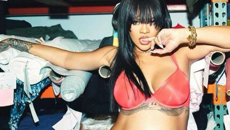 Rihanna flaunts baby bump in stunning lingerie photos
