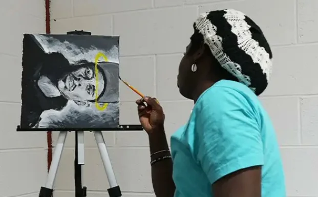 Nigerian student makes new world record for painting for 100 hours
