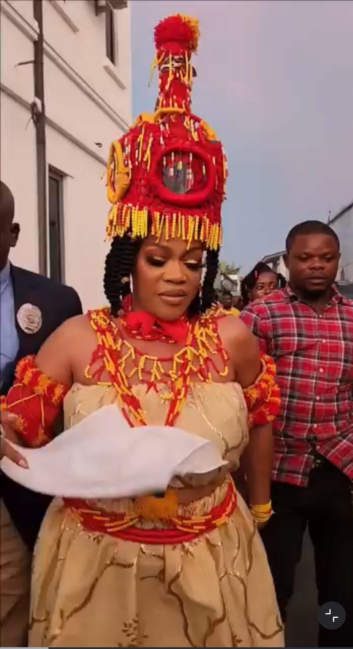 Actress Eve Esin Makes Grand Entrance at Traditional Marriage, Carried on Man’s Neck