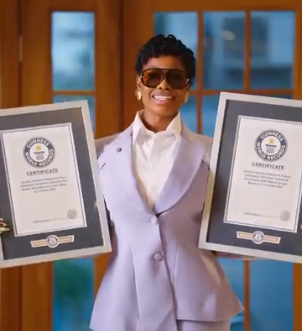 BBNaija Star Tacha Receives Two GWR Plaques for Cosmetic Makeovers