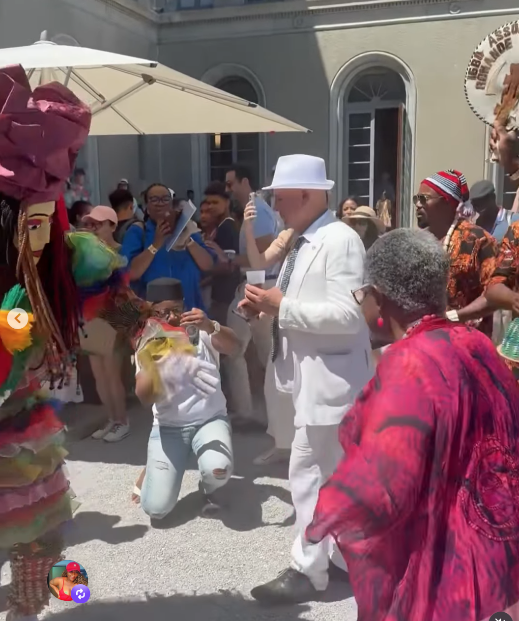 Ngozi Iweala Sparks Reactions With Dramatic Masquerade Dance at WTO Open Day